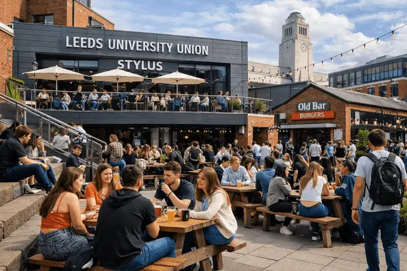 Leeds University Union with students socialising outdoors near Stylus building